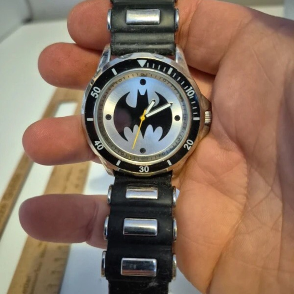 Uniqlo Black and Silver Watch with Iconic Design